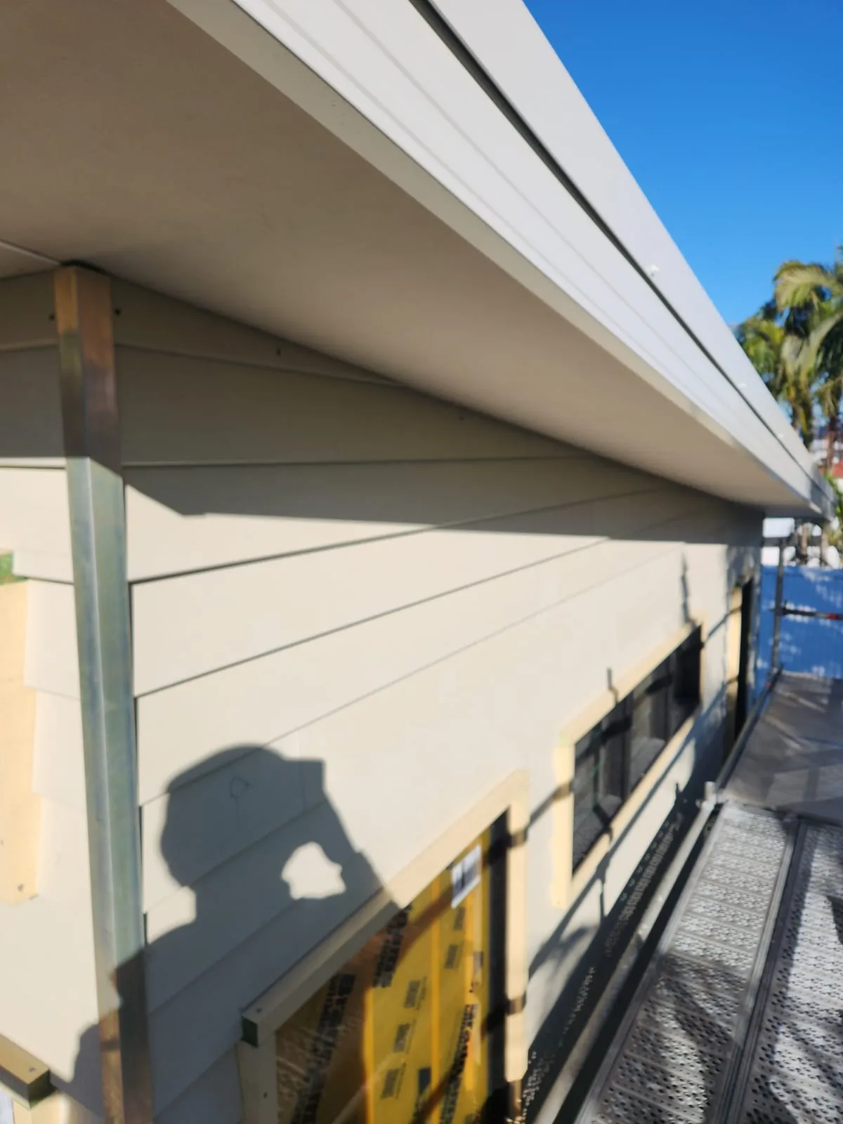 Freshly painted cream eaves and fascia