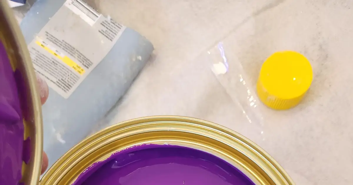 Open tin of freshly tinted paint on a Newcastle job site