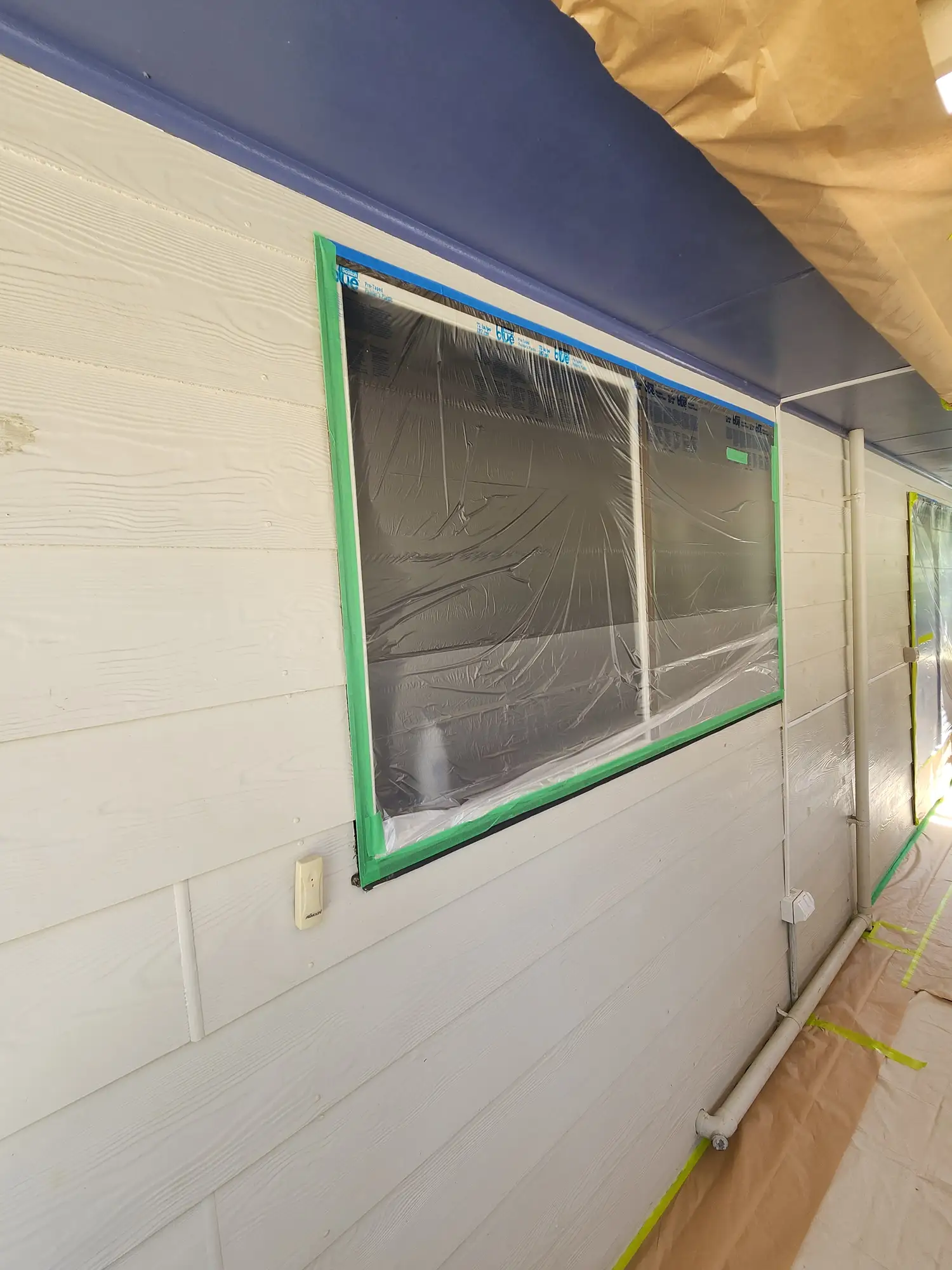 Scaffolding around a coastal Newcastle home during an exterior repaint