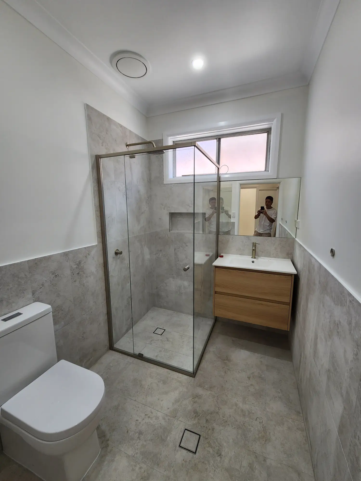 Finished bathroom repaint with shower and vanity
