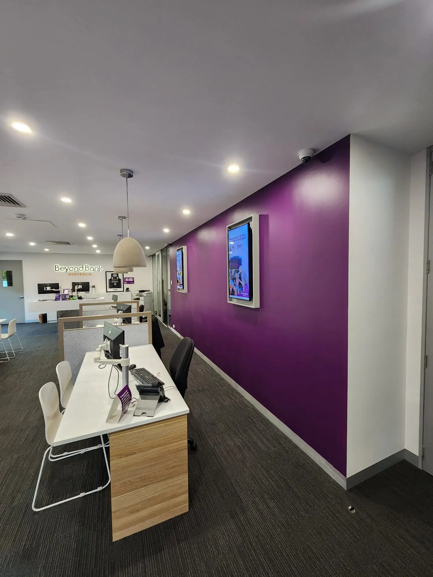 Repainted purple feature wall in a Newcastle bank branch