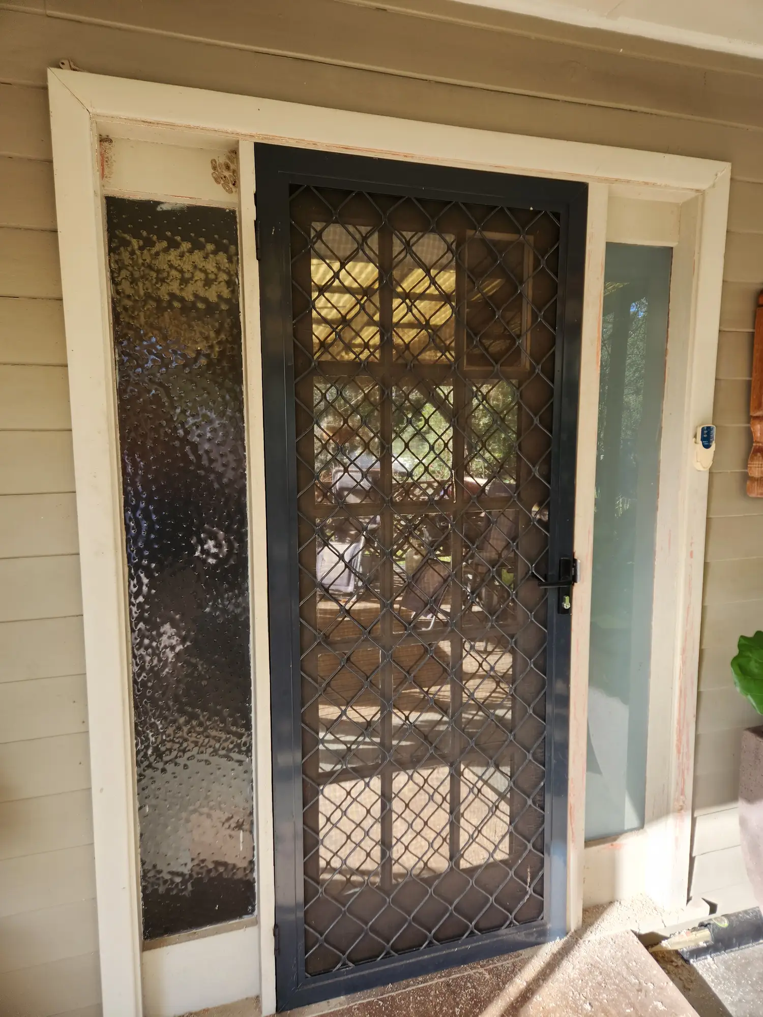 Front entry with a leadlight door before repainting